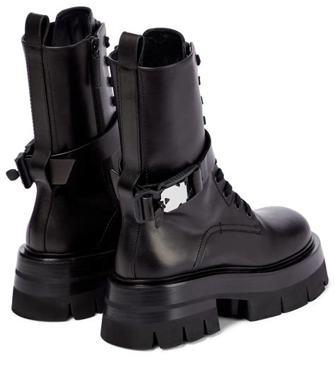 versace leonidas|Versace leather boots.